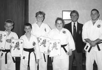 Forest four win black belts
