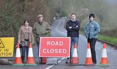 Business dismay as road stays shut for landslip