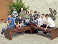 Youngsters pitch in to clean memorial seat
