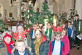 Gather round the Christmas trees