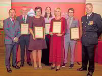 Rowers honoured  for rescuing teens
