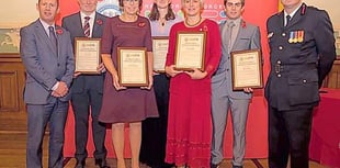 Rowers honoured  for rescuing teens