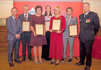 Rowers honoured  for rescuing teens