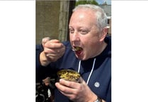 Mayor tucks into bush grub challenge