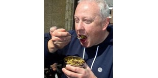 Mayor tucks into bush grub challenge