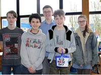 School raises funny money