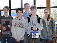 School raises funny money