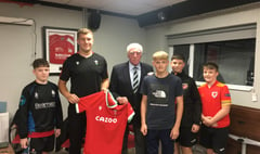 Wales star Ben returns with gift
