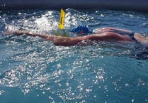 Epic swim by local sculptor