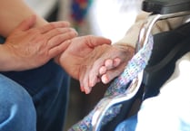 Calls for carers to be paid at least £2 an hour more