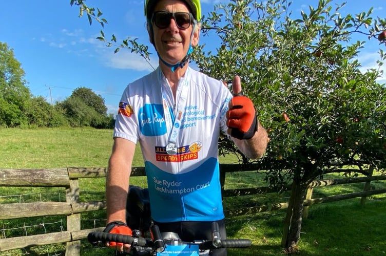 Pic of John president of Newent & District Rotary Club sets out on his cycle challenge for hospice