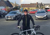 Mark braves the elements for 50-mile charity cycle