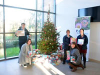 Housing staff and ‘Army’ bring kids Christmas gifts