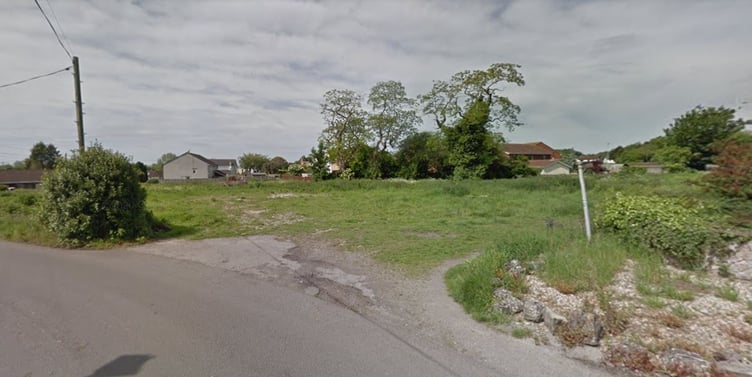 Monmouthshire Council will review the plan to build nine homes on wasteground in Undy