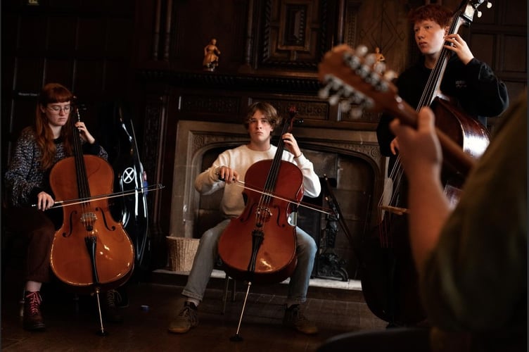 Alf Steward playing the cello