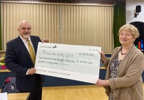 Former mayor gives thousands to beloved local charity