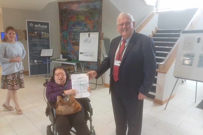 Sarah Griffiths presented a petition calling for the re-opening of the Tudor Centre