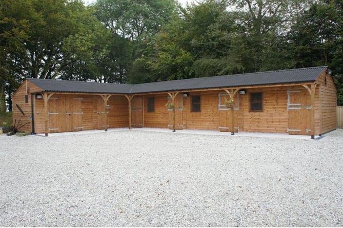 The costs were awarded over an application for stables (example).