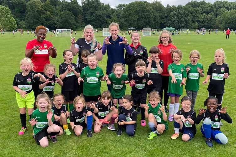 Kerys Harrop with Ross Juniors youngsters when she visited the club two years ago