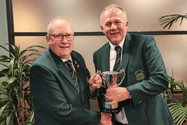 Forest ills captain Ashley James (right) presenting the Richard Mudge Memorial Trophy to Chris Dooley of Brickhampton