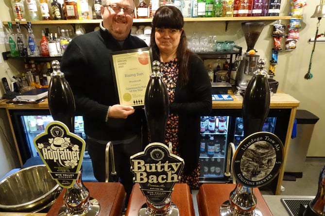 Lee and Sian Clark, who run The Rising Sun in Oldcroft, with the CAMRA Community Pub of the Year award