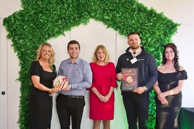 Persimmon employees accepting the award at the Accxel ceremony