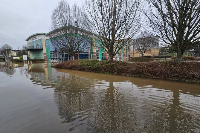 Water has covered the road and car parks next to Monmouth Leisure Centre