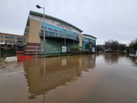Flooding through drains closes road and Monmouth Leisure Centre