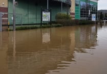 Flooding through drains closes road and Monmouth Leisure Centre