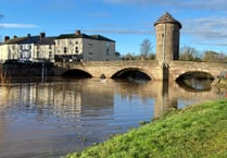 River Monnow high but still as Wye floods hold back water