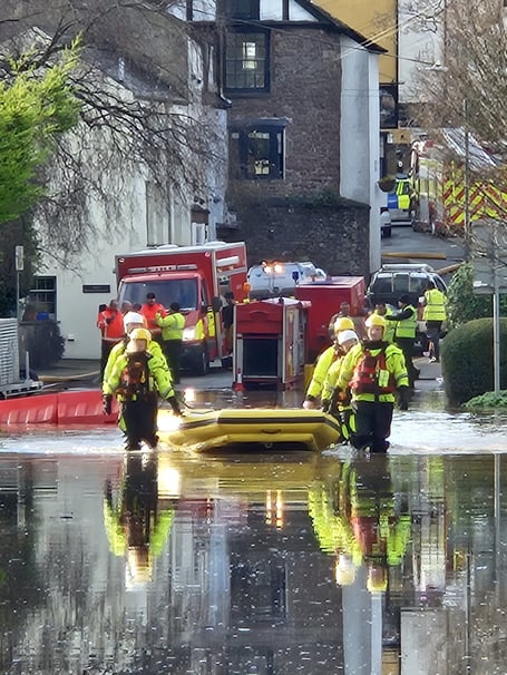 A fire crew with a lifeboat in old Dixon Road, Monmouth