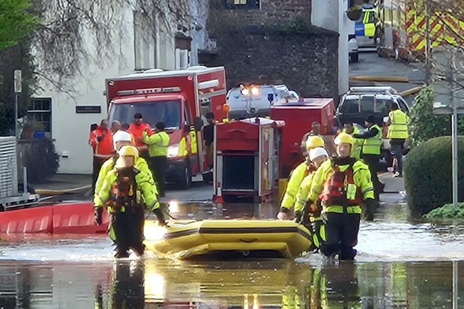 A fire crew with a lifeboat in old Dixon Road, Monmouth