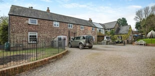 "Exceptional" dock keeper's cottage for sale has panoramic river views
