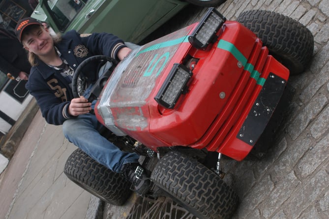 Fifteen-year-old Alfie Thomas from Drybrook with his racing lawn mower.
