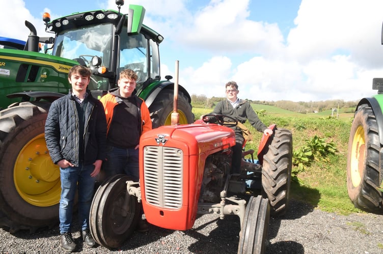 Archie Jones, Elliott Pitchford and Chy Marx with a 1950s Massey Ferguson