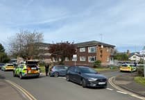 Man in hospital and woman arrested following Monmouth car incident