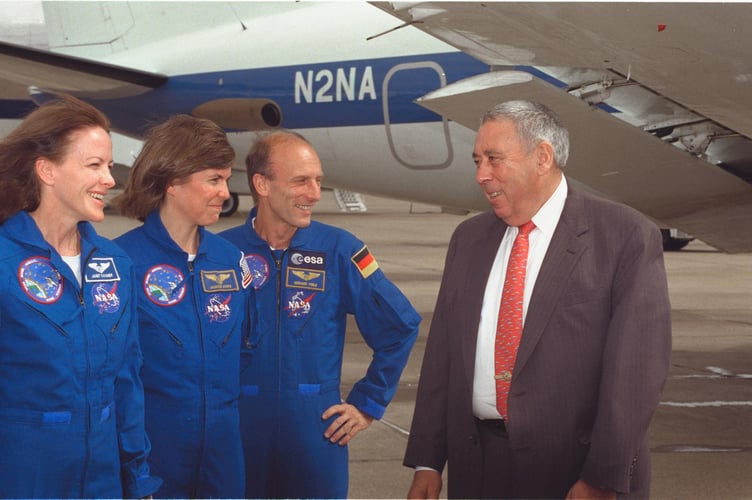 George Abbey with astronauts in the 1980s
