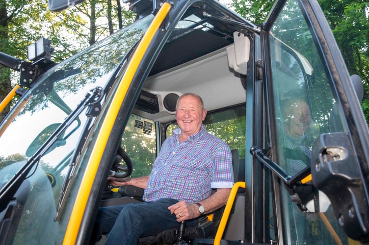 Local farmer Robert Cook supplied the cherry picker.