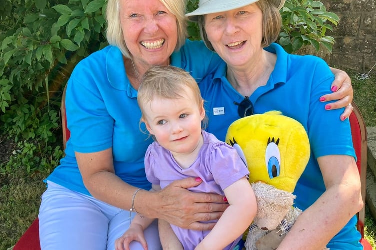 Friends of Longhope Church Chair Tina Coull with Sheila Johns and grandaughter Alice.
