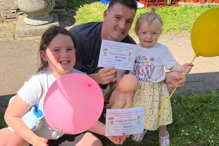 Dan Morgan with his daughters.
