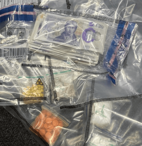Money and drugs seized by police at a festival