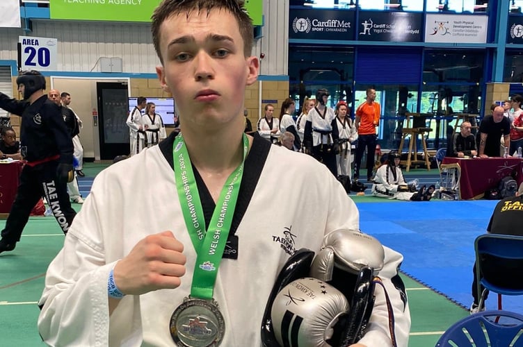 Niall Farr with his medal