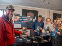 COMMUNITY BUYS IN TO PUB PLAN