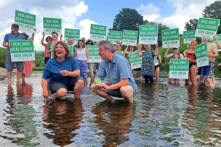 River Cottage star Hugh Fearnley-Whittingstall and North Herefordshire Green candidate, and now MP, Ellie Chowns highlighted the problem of Wye pollution at Hoarwithy during the last election. Photo: BBC Local Democracy.