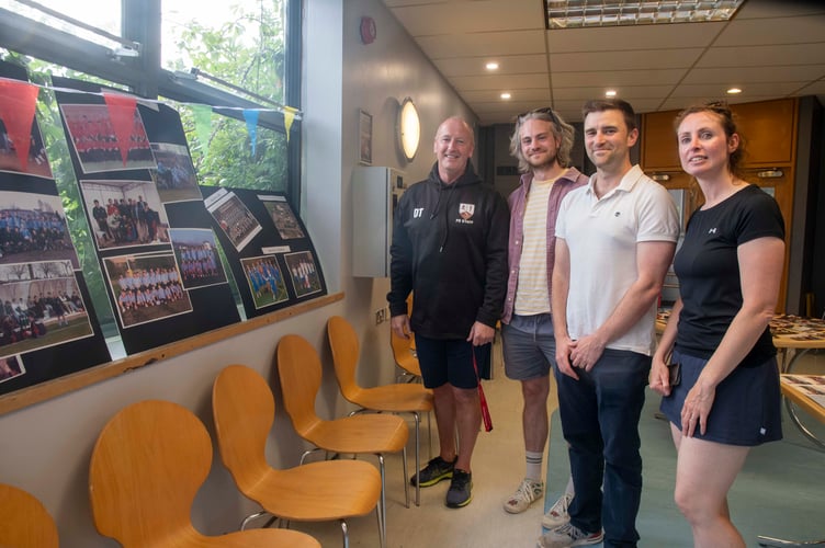 Vice principal David Thomas and Claire Rush from the PE team with Sam Fitzpatrick and Jonathan who both went on seven rugby tours while pupils at Wyedean.
