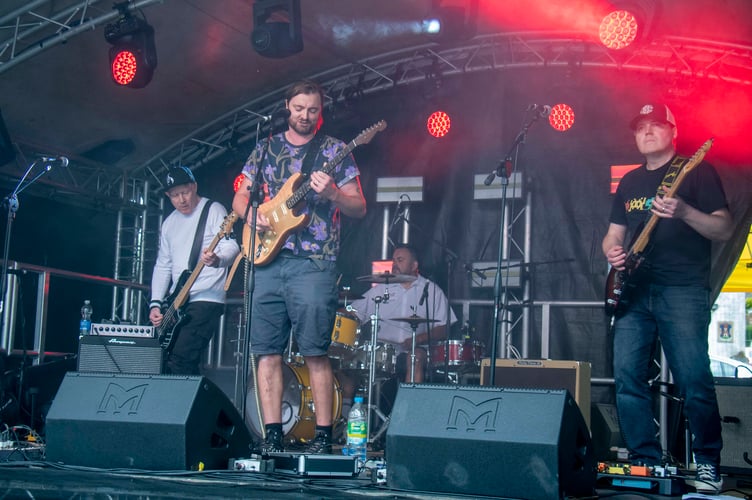 Fire Sprung performing in St John Street.