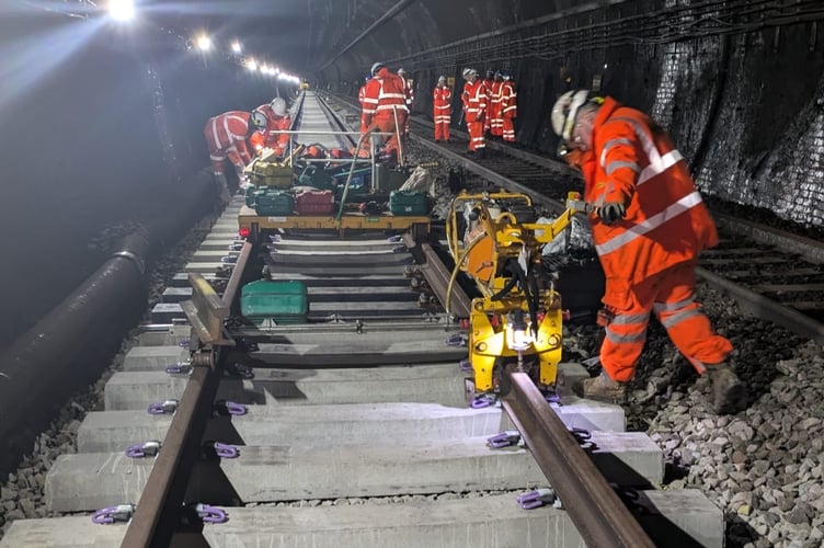 Engineers working on the track.