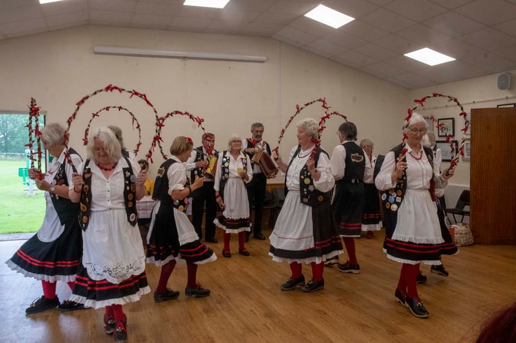 A dance by the Mason's Apron clog dancing team.