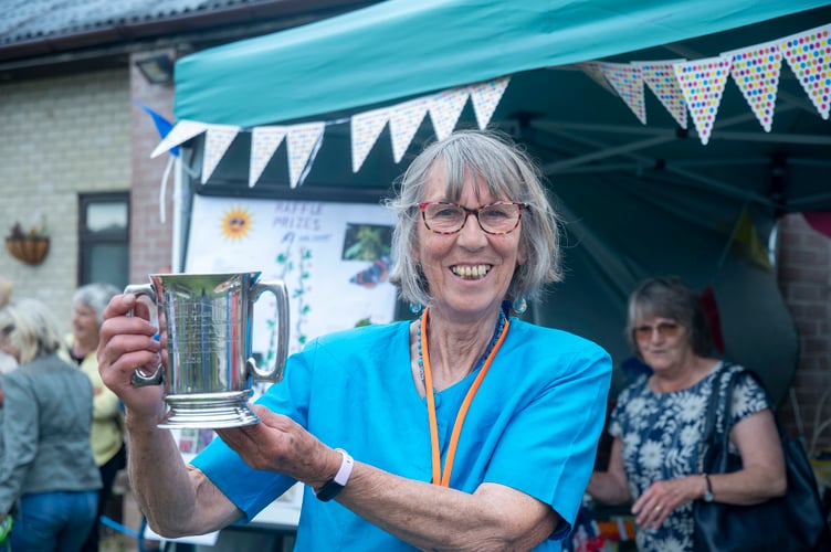 Diana Standing with the Battle of the Villages Cup which was won by Bream.