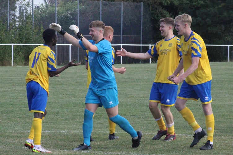 Kingfishers players celebrate after winning through in the Welsh Cup.